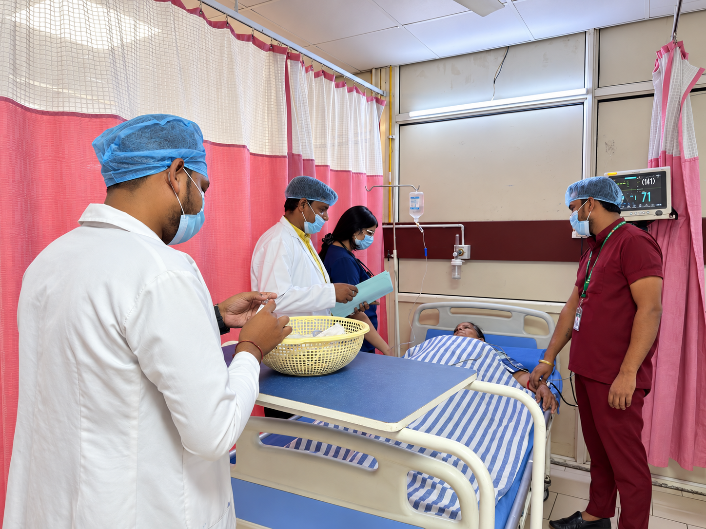 Hospital Ward Team Caring for Patient