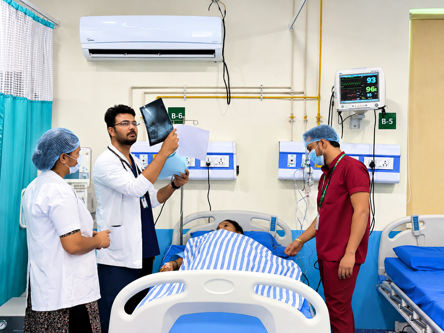 ICU Team Reviewing Patient X Ray